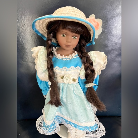 Charming Blue and Cream Doll with Hat